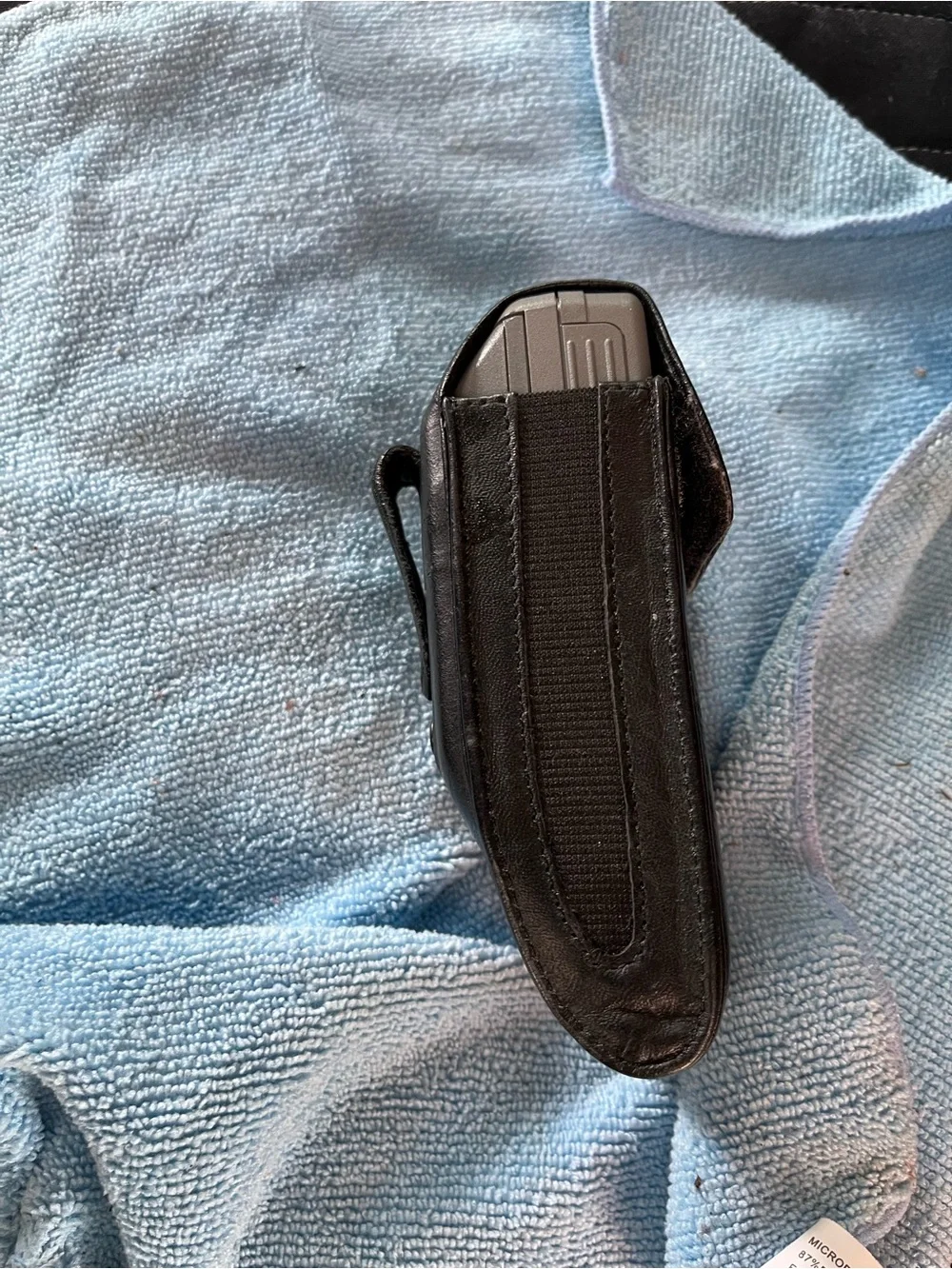 Motorola Silver Flip Phone with Numeric Keypad and Antenna
